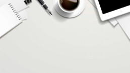 top view of working place elements on white table